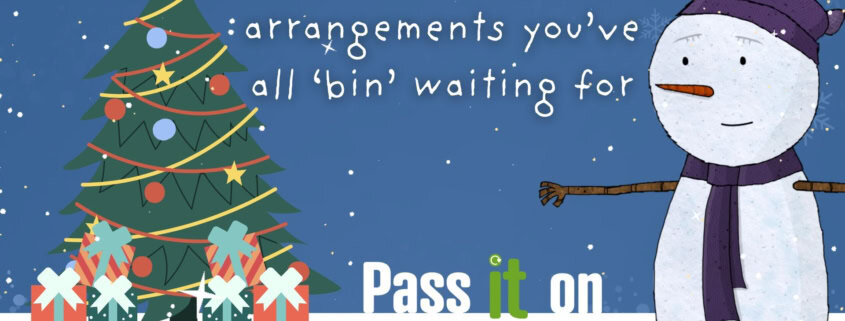 A snowman waves next to a decorated Christmas tree with presents. Text reads: "The Christmas arrangements you’ve all ‘bin’ waiting for. Pass it on." West Northamptonshire Council logo is in the corner. Snow is falling.